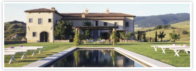 Villa with pool and scenic landscape view.