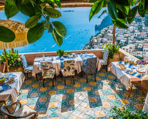 Positano Villa patio looking out over the ocean and hillsides from high above the coast.